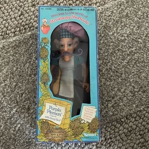 Strawberry Shortcake’s Purple Pie Man figuring with Berry Bird